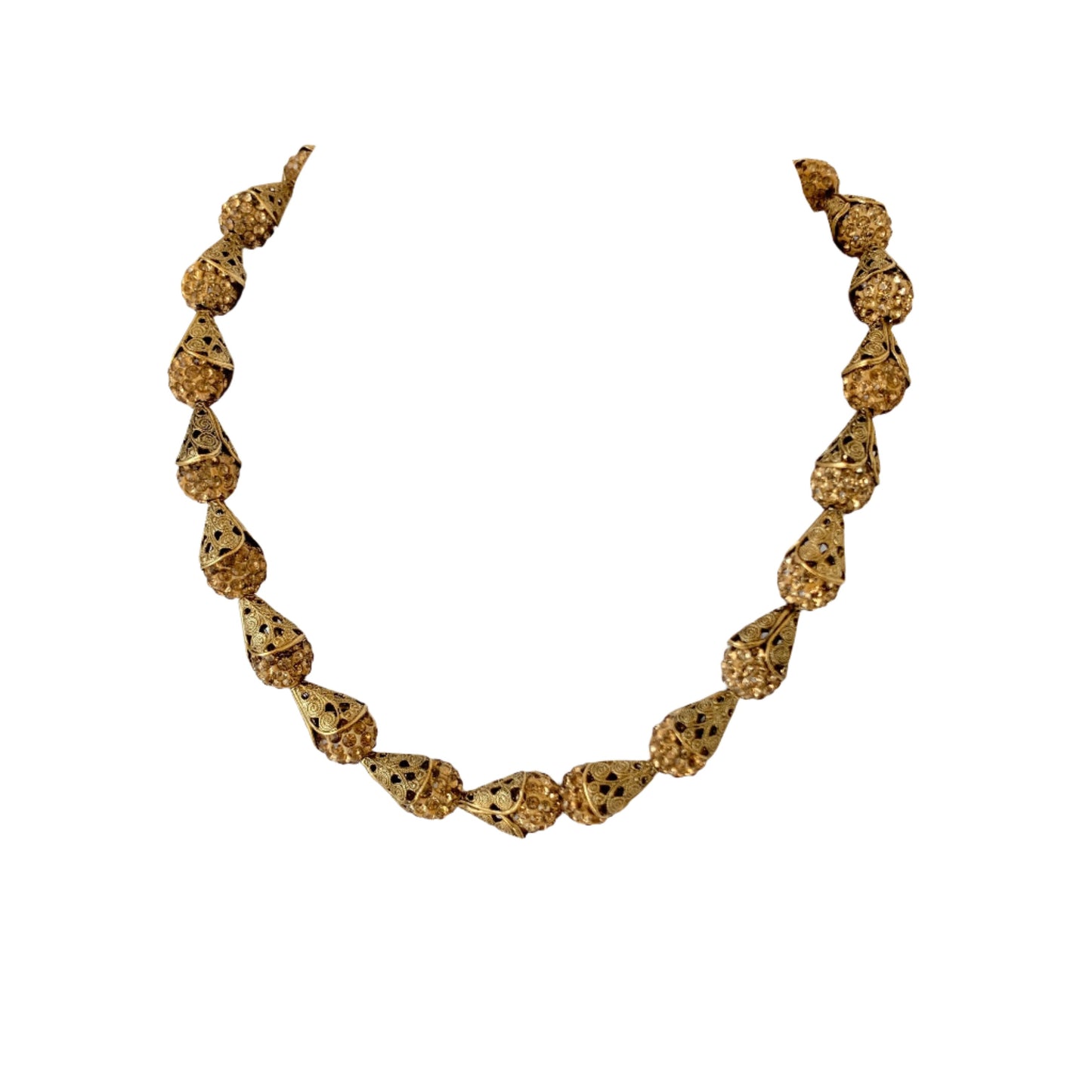 Little Black Dress Approved! Inspired by the glamorous days of the Great Gatsby style of the roaring 20's art deco movement we bring to you this sparkling charm necklace! Shimmering rhinestone clay pave beads catch the light for an attention-grabbing style encased in our signature brass filigree bead cap. Necklace measures 16-inches with 3-inch extension, but if you need more length please let us know. This necklace is designed to be worn as a choker but we understand that not all necks are the same.