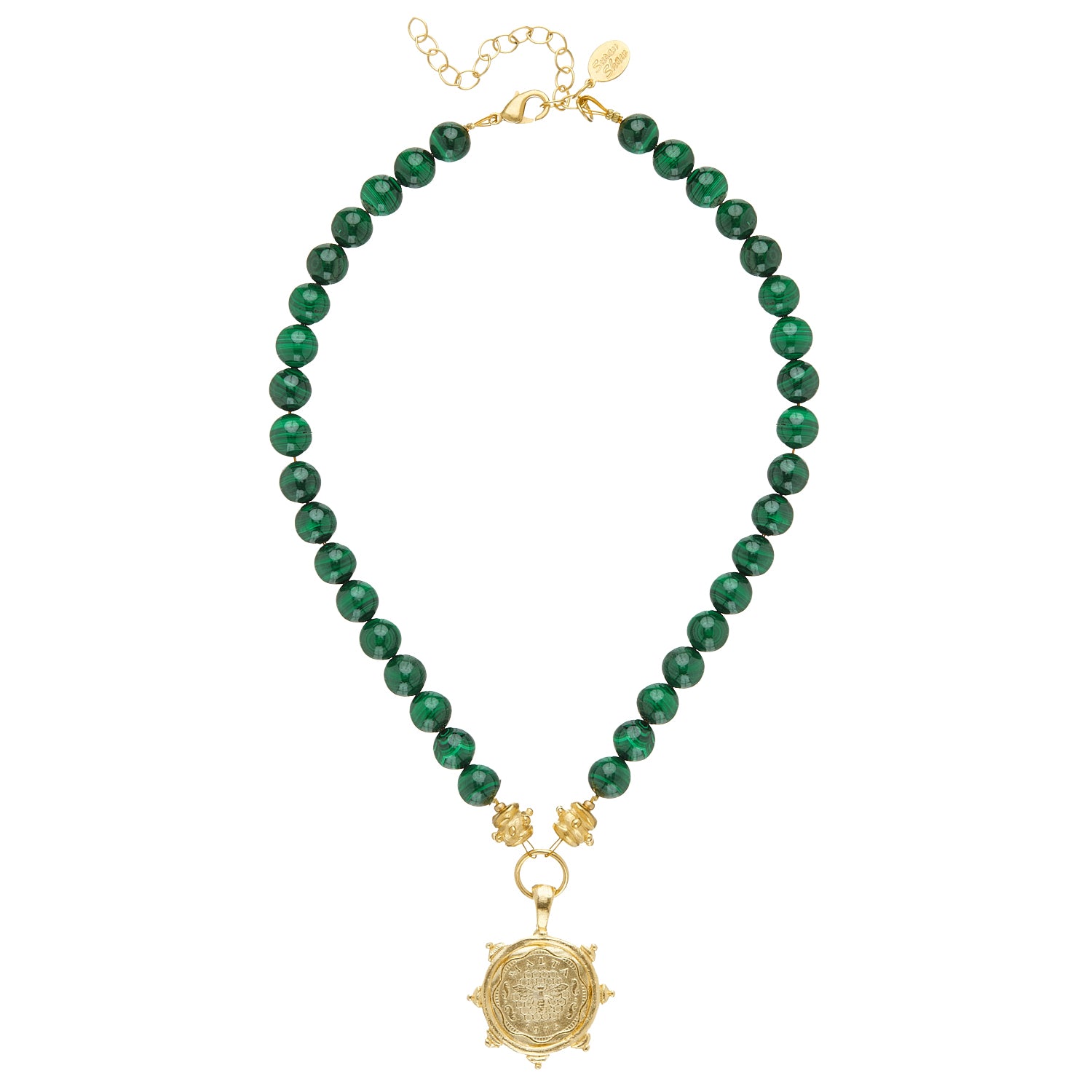 Add a touch of wanderlust and worldly charm to any ensemble with the Malachite Bee Coin Necklace. Boasting authentic Malachite beads in stunning shades of green, this necklace brings a touch of posh glamor and earthy vibes, making it an ideal accessory for a special event paired with your beloved pendant design. Handcrafted by Susan Shaw, this 24k gold plated necklace measures 16 inches with a 3 inch extender chain.
