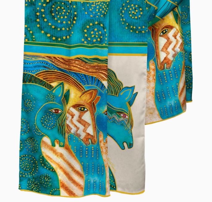This Fine Art Silk Blend Shawl, called the Sky Mares, is a colorful, cozy and stylish accessory that can be worn as a wrap or scarf. Each piece is inspired by a museum artwork, staying true to its original design and colors. Enjoy the soft, draping feel of the fine silk fabric and its reversible print which complements a solid color. Versatile in use, this shawl can be hand washed and hung to dry. Measuring at 28” x 78” (71 cm x 198 cm), the Sky Mares shawl is a true work of art.