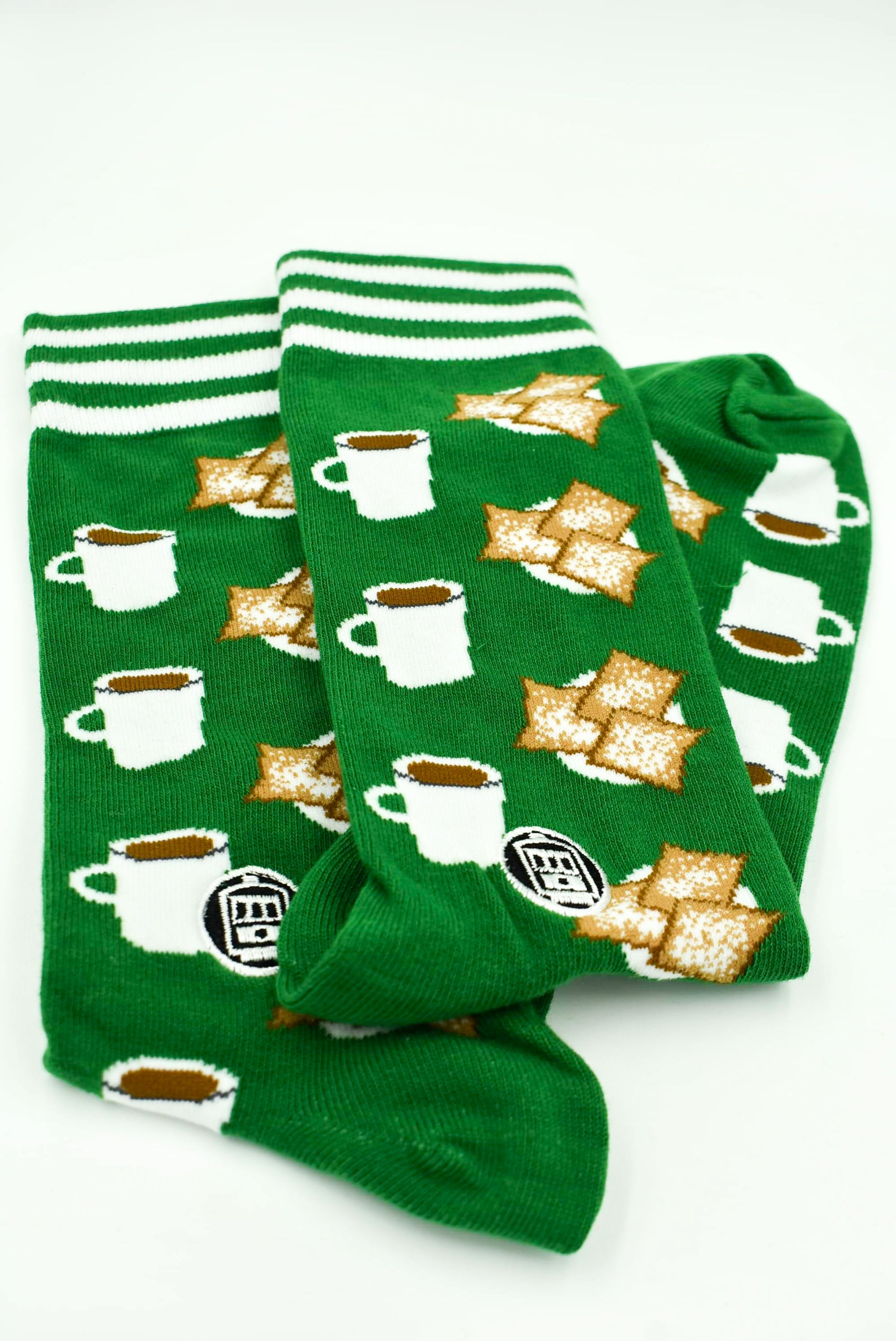 Green and White Unisex Socks with Coffee and Beignet graphics. Crew/Calf socks