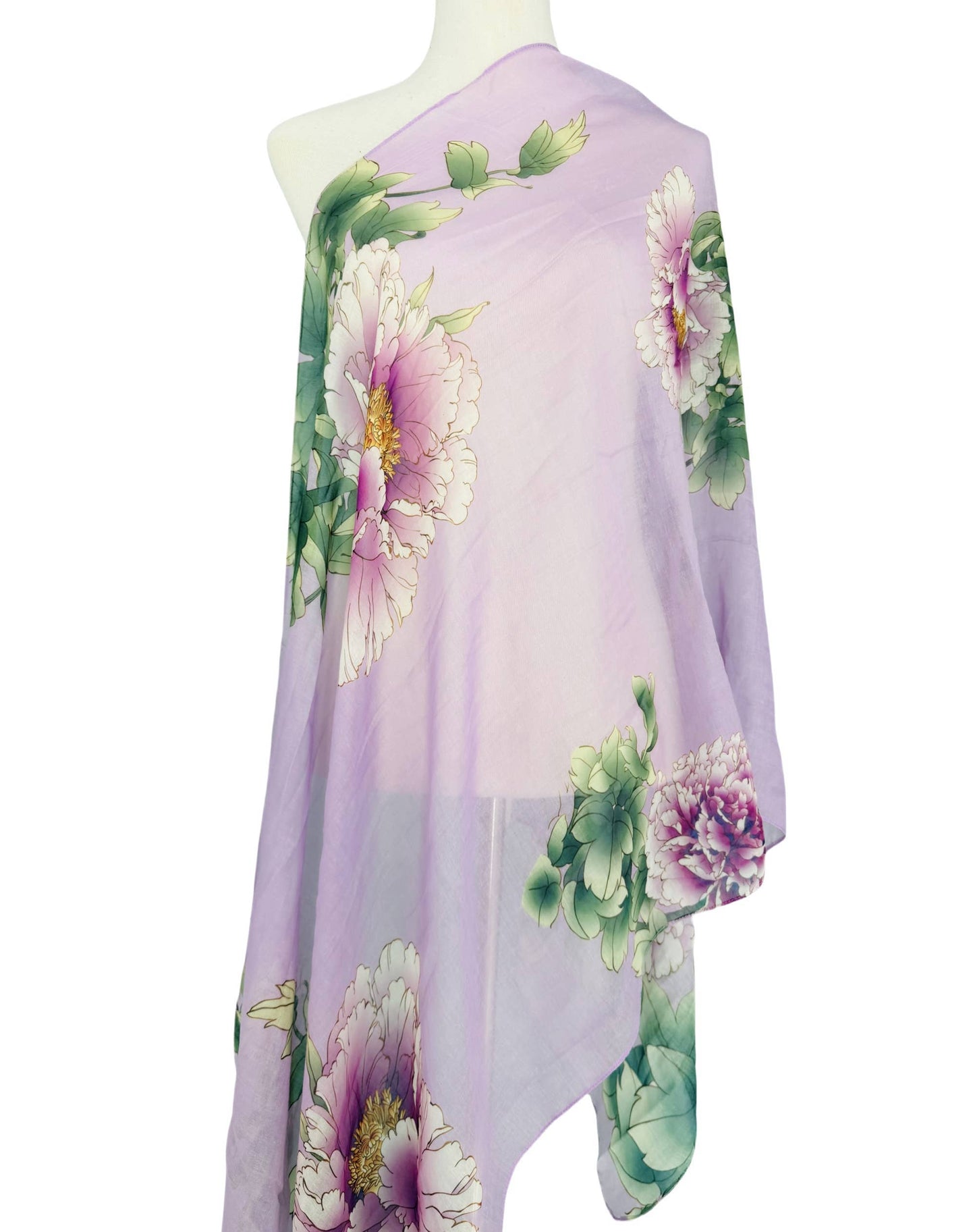 Lavender dress with floral patterns on a mannequin against a white background