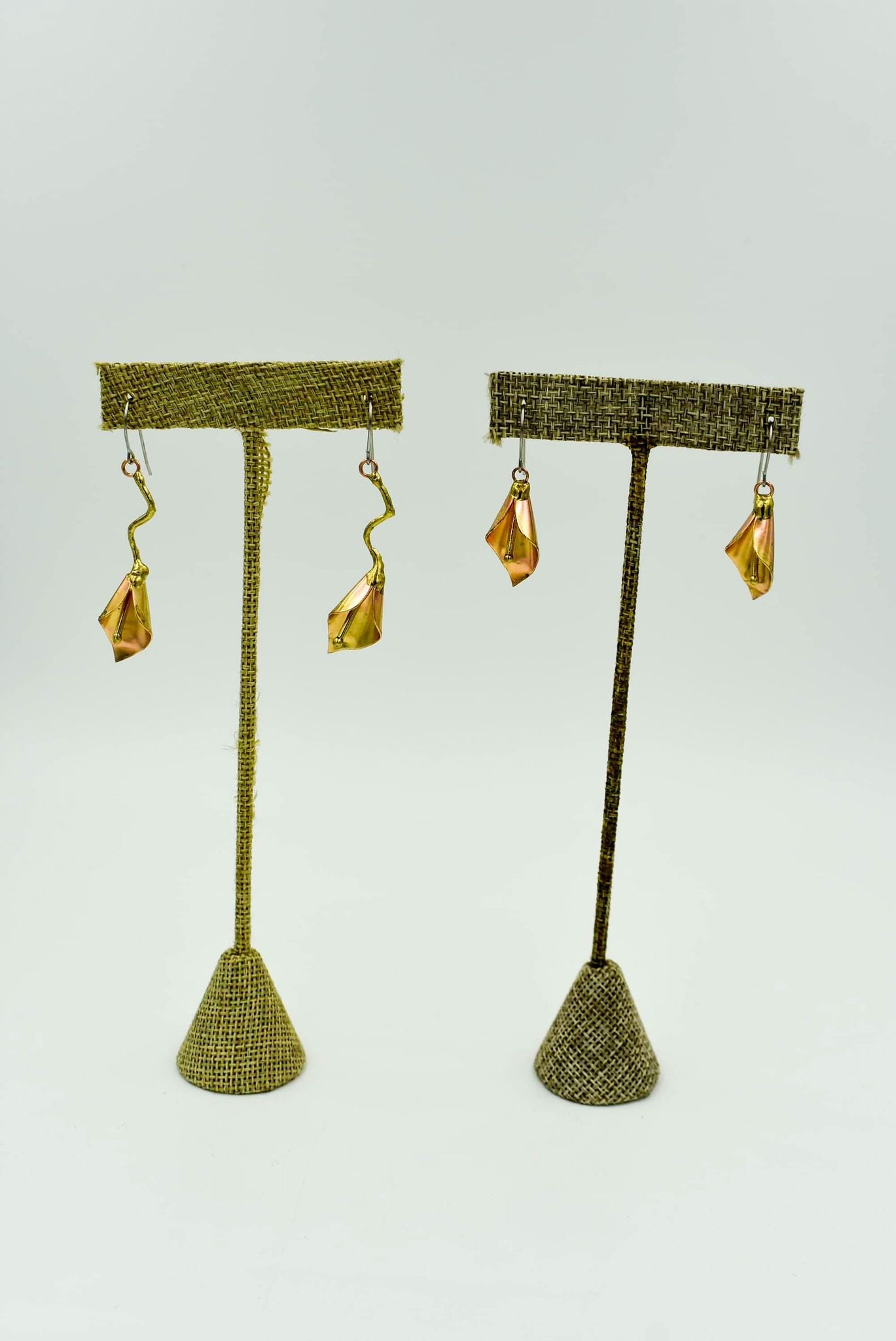 Calla Lily Drop Earrings. 2" long Metals include enameled, Brass, bronze, and copper with silver Made by a local Louisiana artist
