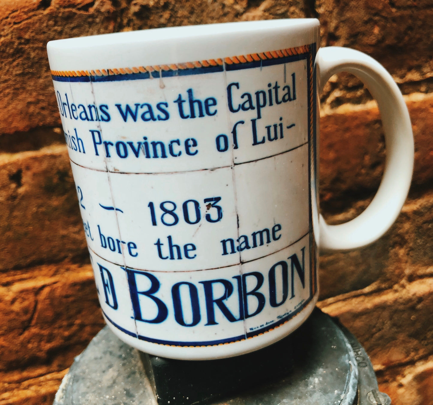 Replicas of the Spanish colonial street names found around the French Quarter. 11 oz mugs Microwave and dishwasher safe Locally made in Louisiana Available names: Orleans, Bourbon, Plaza D' Armas, Real (Royal), Del Main (Dumaine) and San Luis (St. Louis)