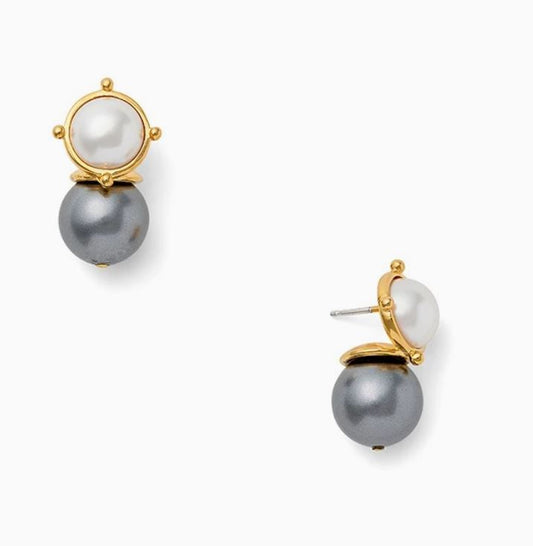 Add a touch of elegance to your outfit with these Grey and Pearl Post Earrings by CC and Co. Featuring a 10mm white mother of pearl cabochon on top and a 12mm grey mother of pearl quartz drop, these earrings are secured with a surgical steel post and hypoallergenic rubber backing. Perfect for any occasion, these earrings are a must-have for your jewelry collection.
