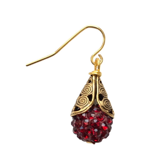 This is a classic earring style that never leaves the Lenora Dame collection. Sparkling rhinestone paves cupped into high-quality gold plated brass filigree bead caps with detailed scrolled etching give these earrings a high-end vintage earring look. Perfect gift or treat yourself to this earring that's perfect to add a little bling and sparkle to casual or special occasion outfits. 1" drop; Handmade in the USA.