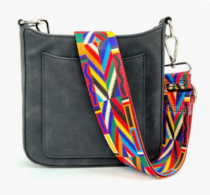 Ashley Suede Crossbody Bag Black The Ashley Crossbody Bag is a stunner - with lux vegan suede in popping colors and two straps: one vibrant guitar and one faux suede to match. Not to mention the built-in RFID-protected card slots, this purse is the hottest way to keep your goodies safe and stylish. Plus, the open pocket on the front is perfect for easy access!