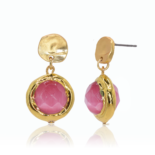 Create a playful look with Coriandoli Earrings in French Pink! These earrings feature colorful faceted beads that dangle from a simple stud, crafted from a pewter alloy base and plated with 24-kt gold or sterling silver. With colored beads and a 1-inch length, these earrings are secured with a post back closure. How fun!