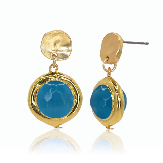 Coriandoli Post Earrings in Aquamarine Blue Playful faceted colored beads dangle from simple stud to create these earrings&nbsp; Pewter alloy base plated with 24-kt gold / sterling silver. Colored beads Measurements: 1" long Earring closure: Post back