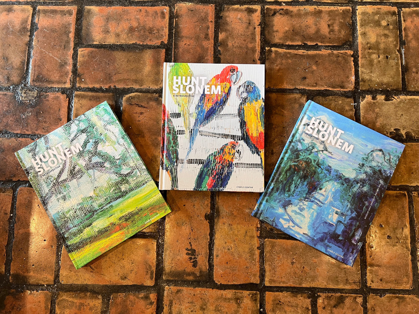 Three Catalog Covers of the Hunt Slonem: A Retrospective Catalog Live Oak, Rosellas, Bayou Teche Cover. Brand New Exhibit inside the Cabildo Louisiana State Museum In The French Quarter 
