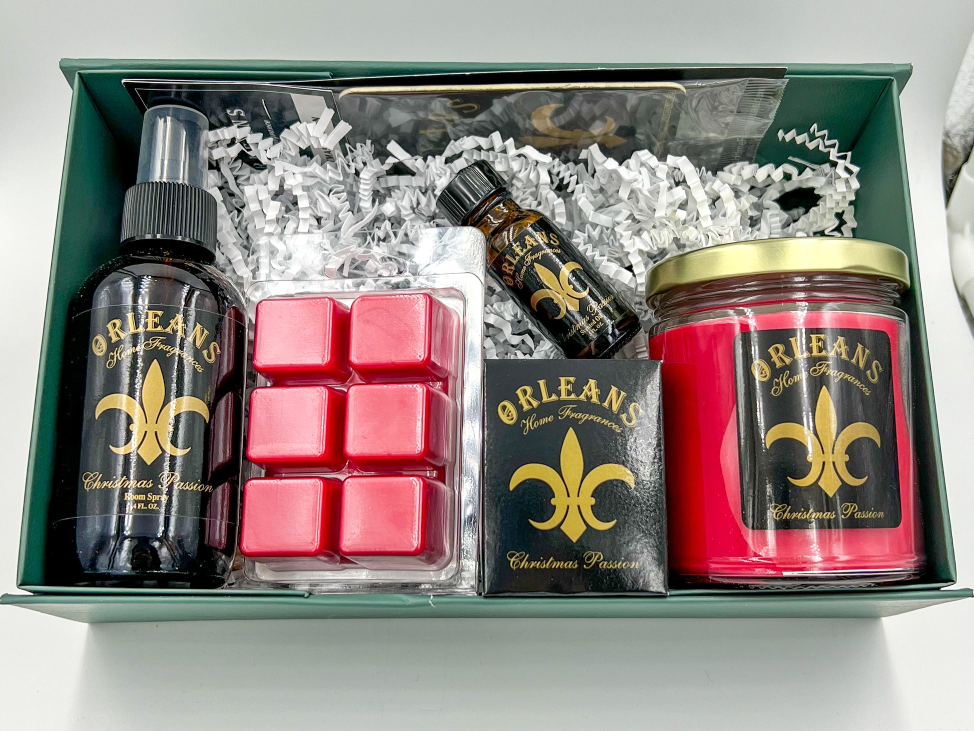 Christmas Passion Gift Set Included scented oil, 9 oz candle, votive candle, auto fragrance, 4 oz room spray, and wax melt. box included