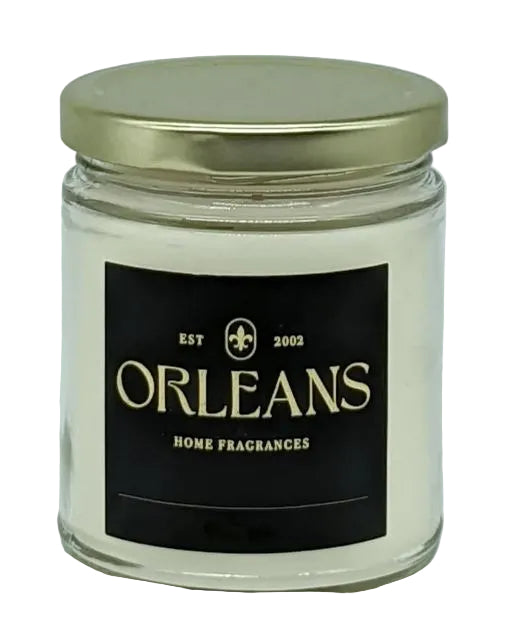 Jar of Orleans Home Fragrances candle on a light gray background