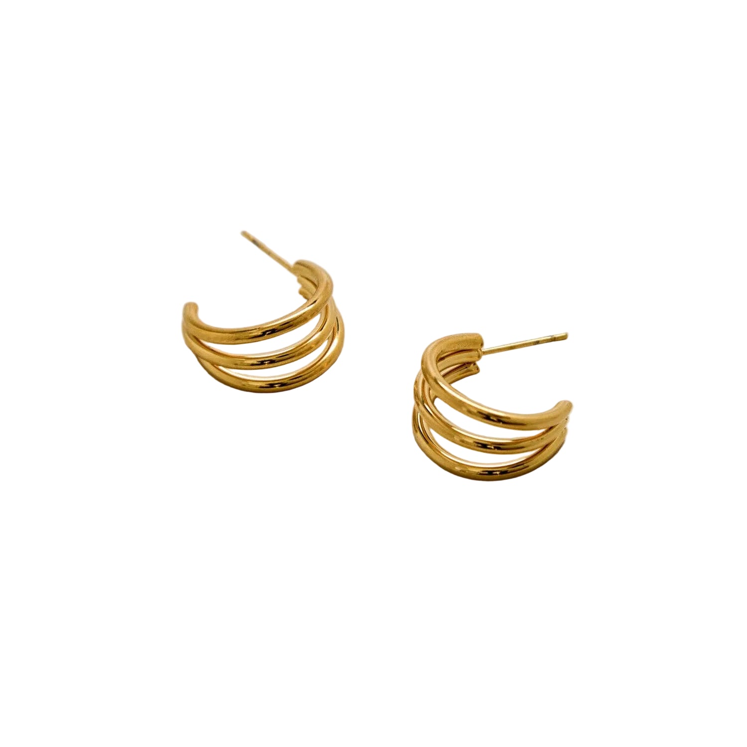 Pair of gold hoop earrings on a light gray background