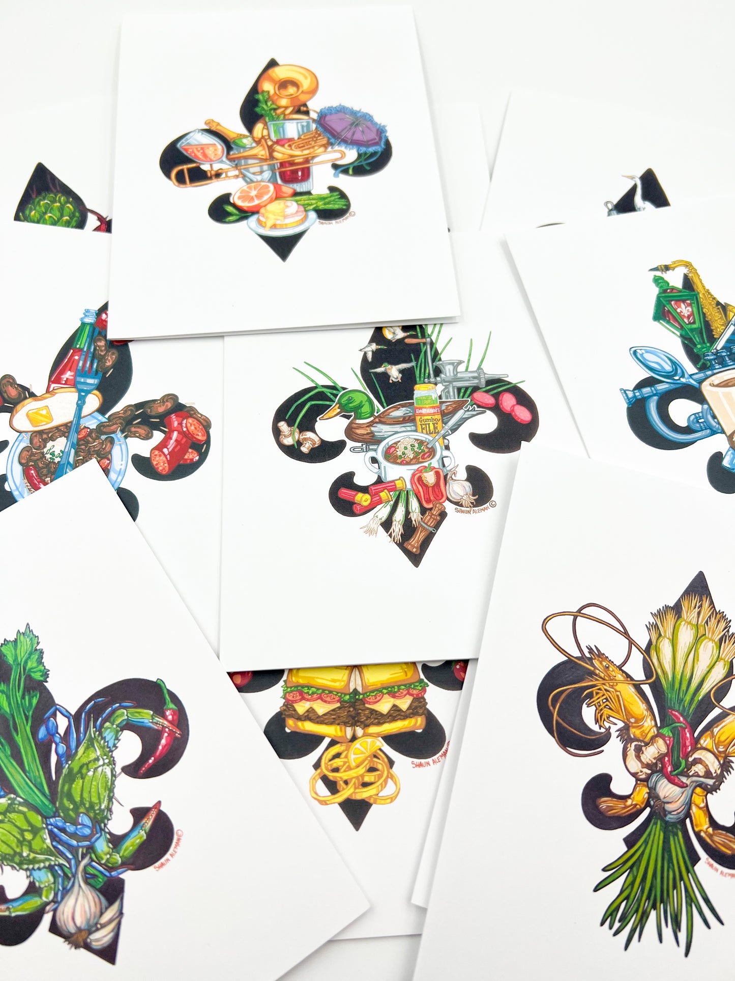 Different styles of fleur de lis with original artwork from Shaun Aleman