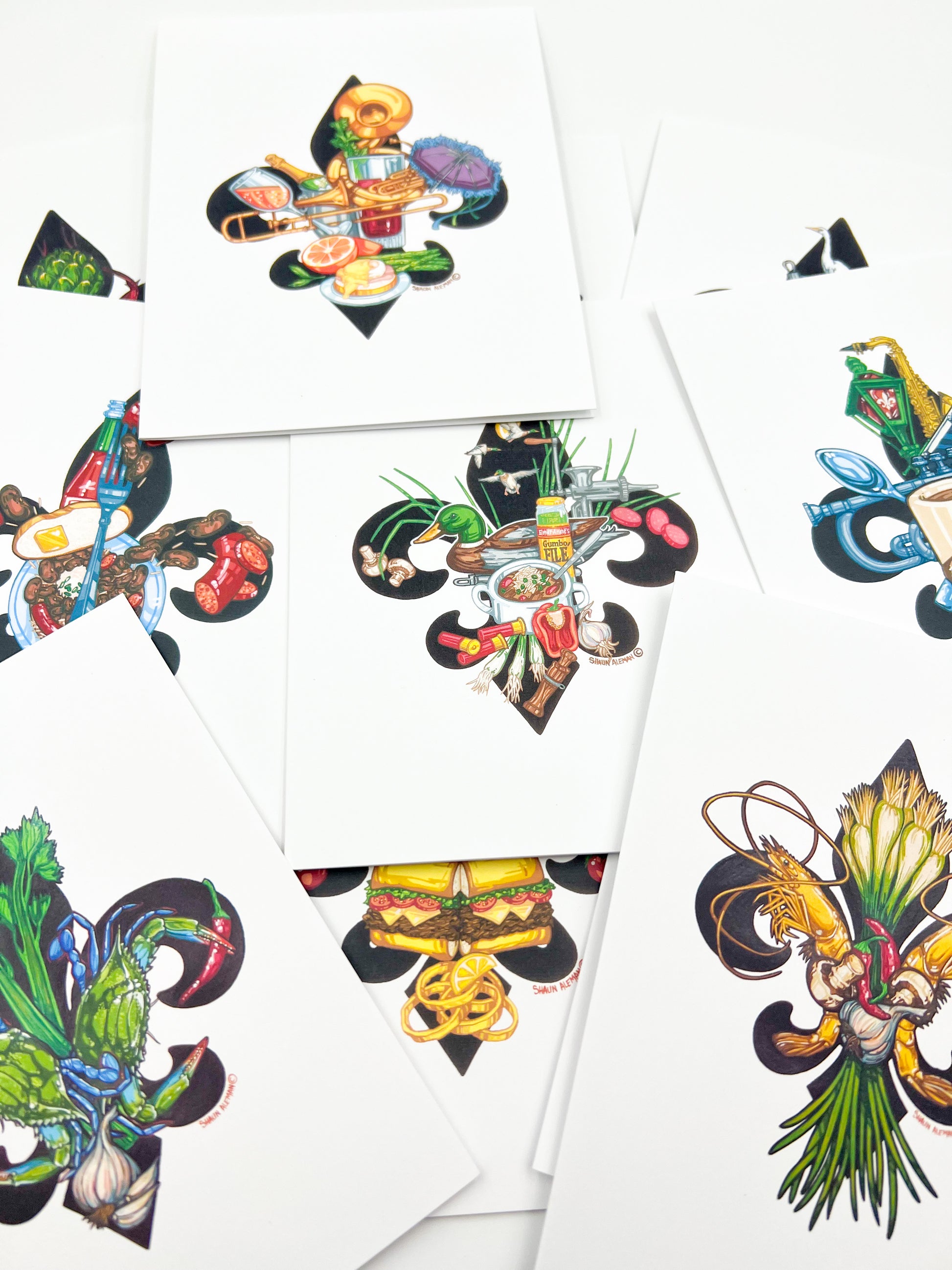 Different styles of fleur de lis with original artwork from Shaun Aleman