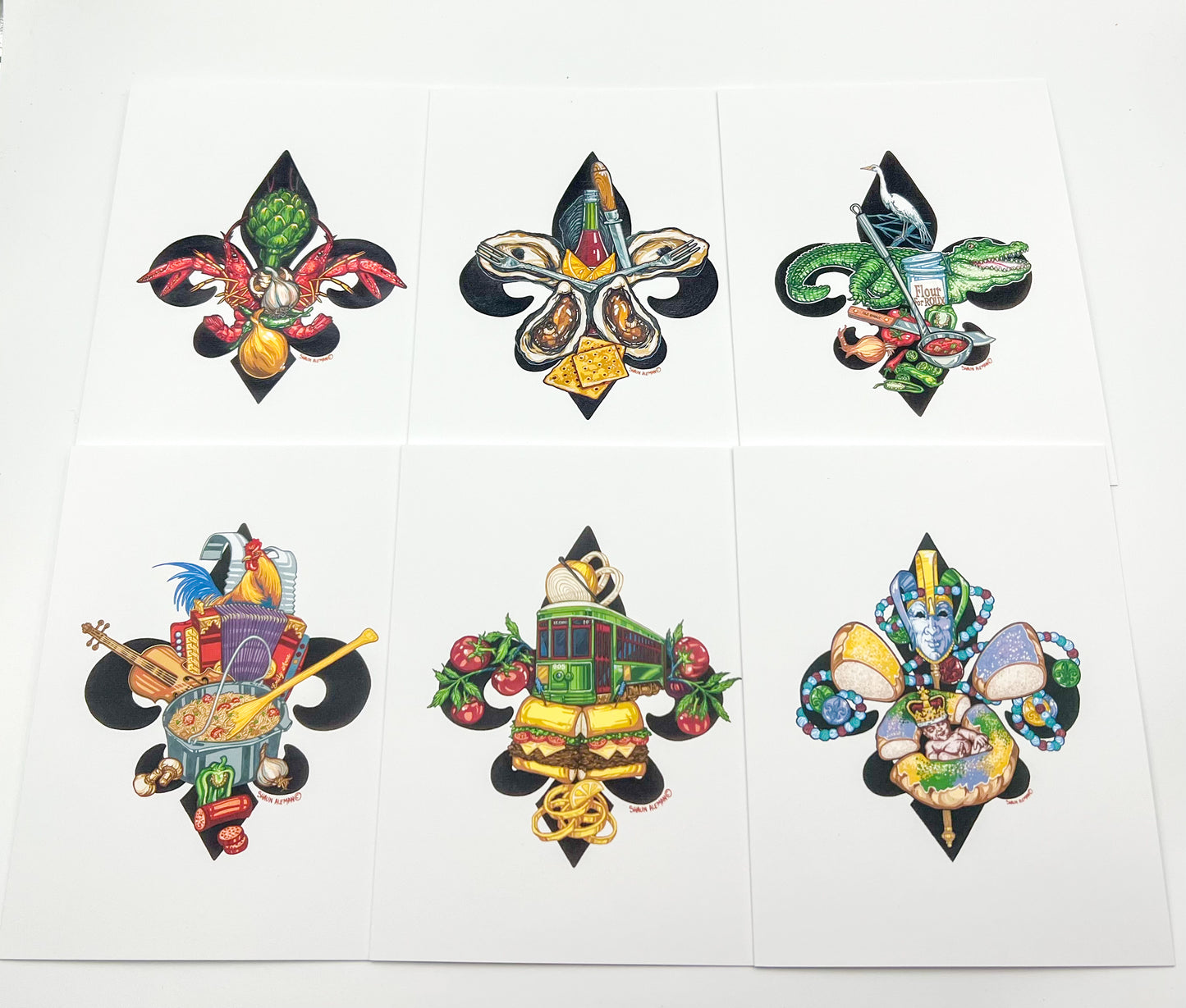 Six colorful fleur-de-lis notecards