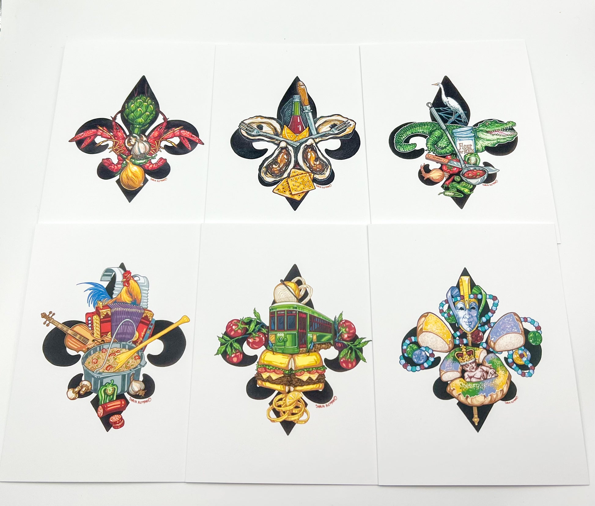 Six colorful fleur-de-lis notecards