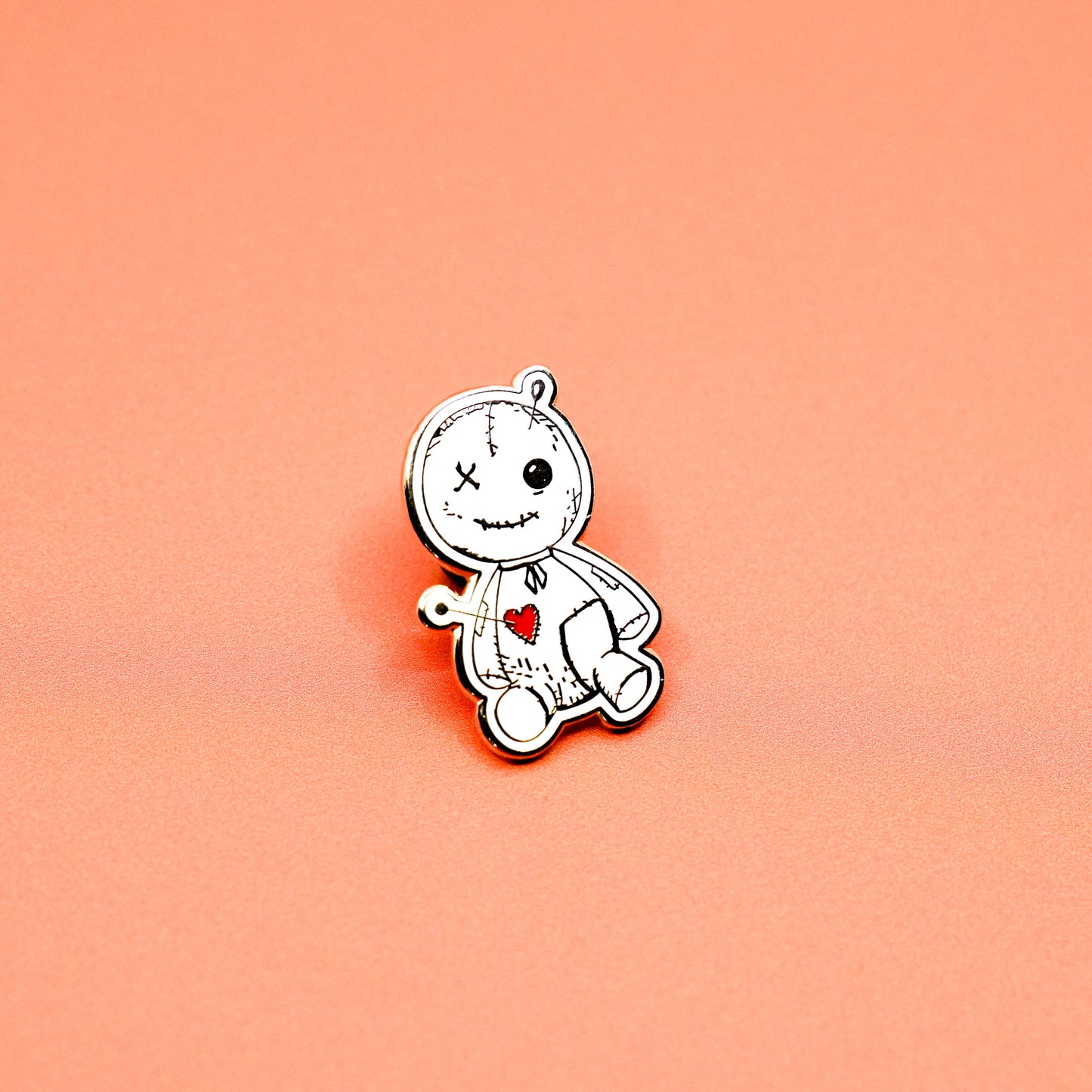 Summon some magic with our Voodoo Doll enamel pin! This gold plated pin features a cute and quirky original illustration, measuring 1-1/4" x 3/4". Created by local artist Statement Goods, this pin comes with a secure Black Rub for added style.
