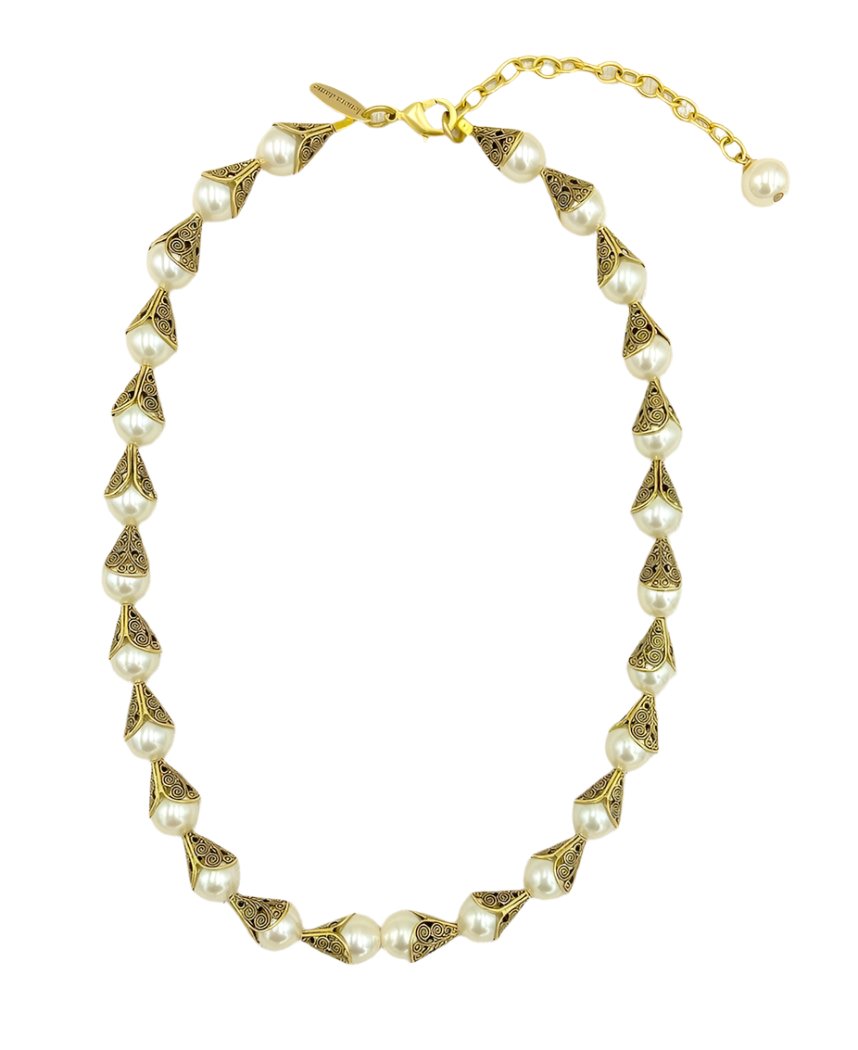 A dainty choker-style necklace with white pearls encased in the Lenora Dame signature gold-plated brass filigree bead cap and strung together for a vintage-inspired glamorous look. Has such a Great Gatsby glam vibe. Simple pearl filigree bead cap earrings also available.&nbsp;