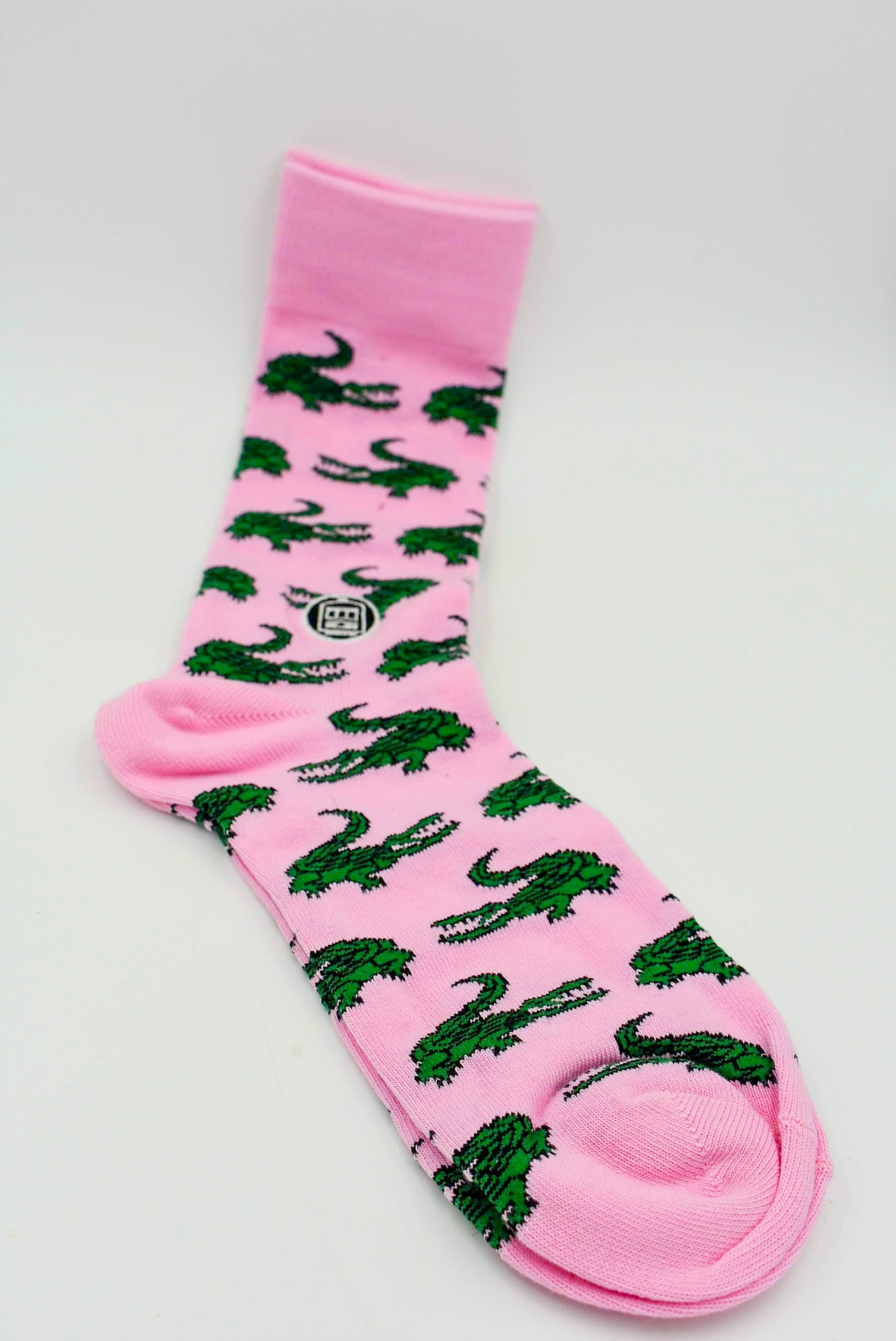 Calcetín de cocodrilo rosa