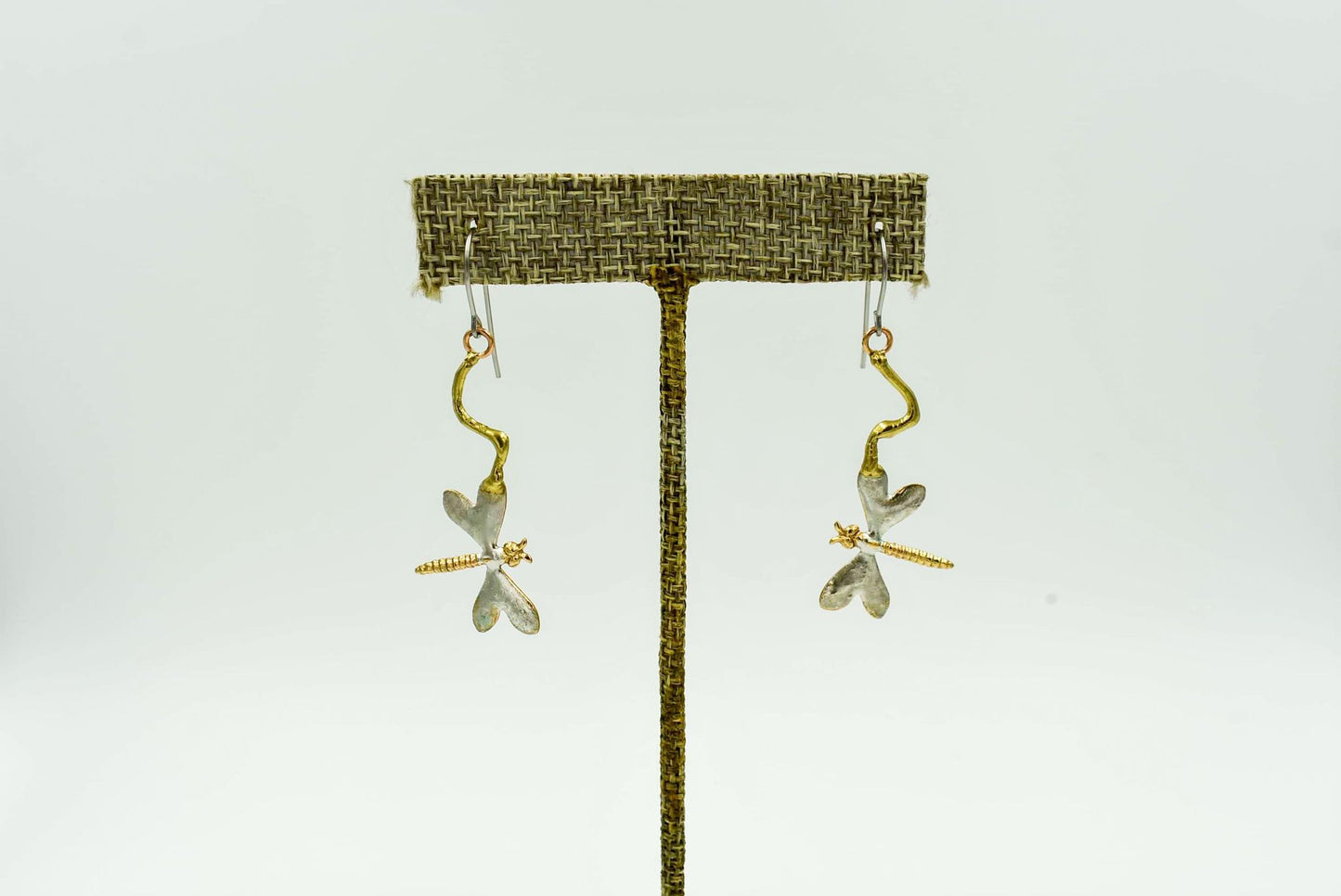 Small Dragonfly Drop Earrings that measure 2" down. Made from brass bronze and copper with sterling silver wire back