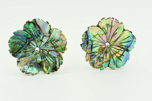 Clip Earrings in the shape of flowers. Abalone Color with Jewel in the Middle. 